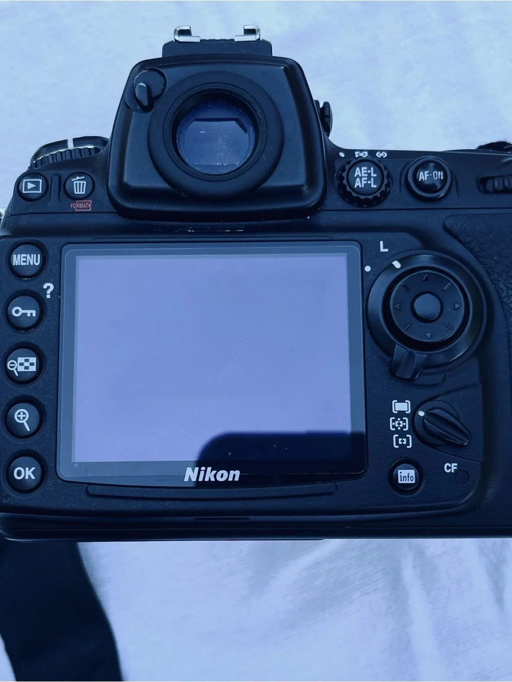 Nikon D700 with 50mm lens, battery grip.